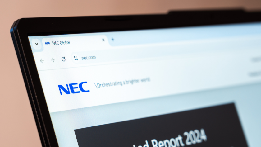 NEC global technology and IT solutions company website displayed on laptop screen