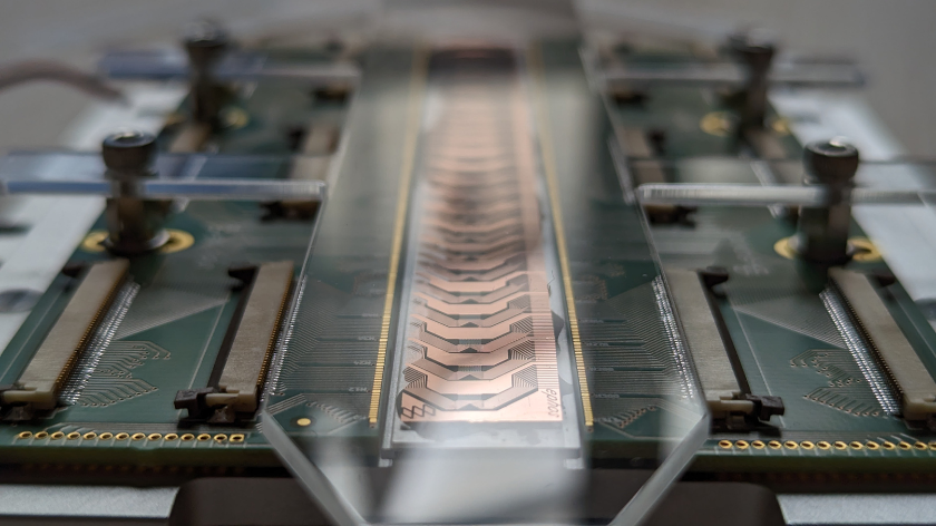 A close-up of a glass-based quantum chip from Ephos