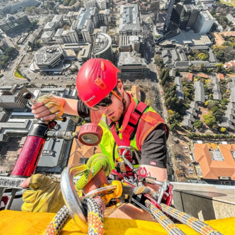 Ruan at the top of a large building