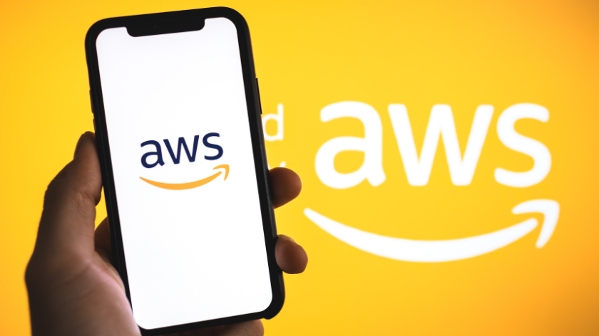 Amazon Web Services logo on the smartphone screen.