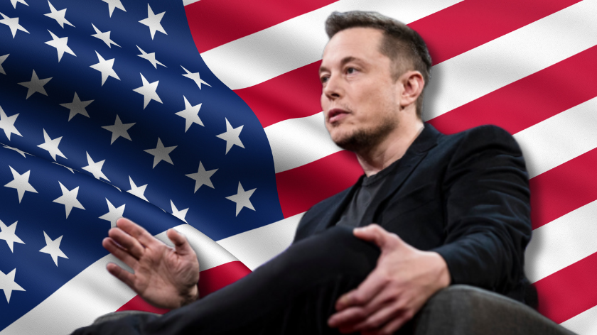 Elon Musk silhouetted against the USA flag